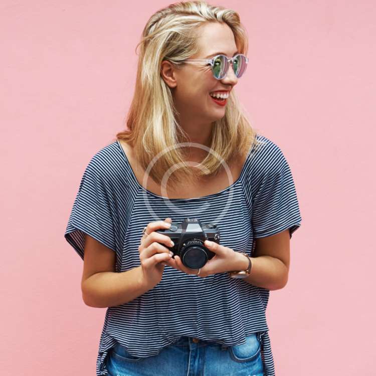Woman with Camera - stock image